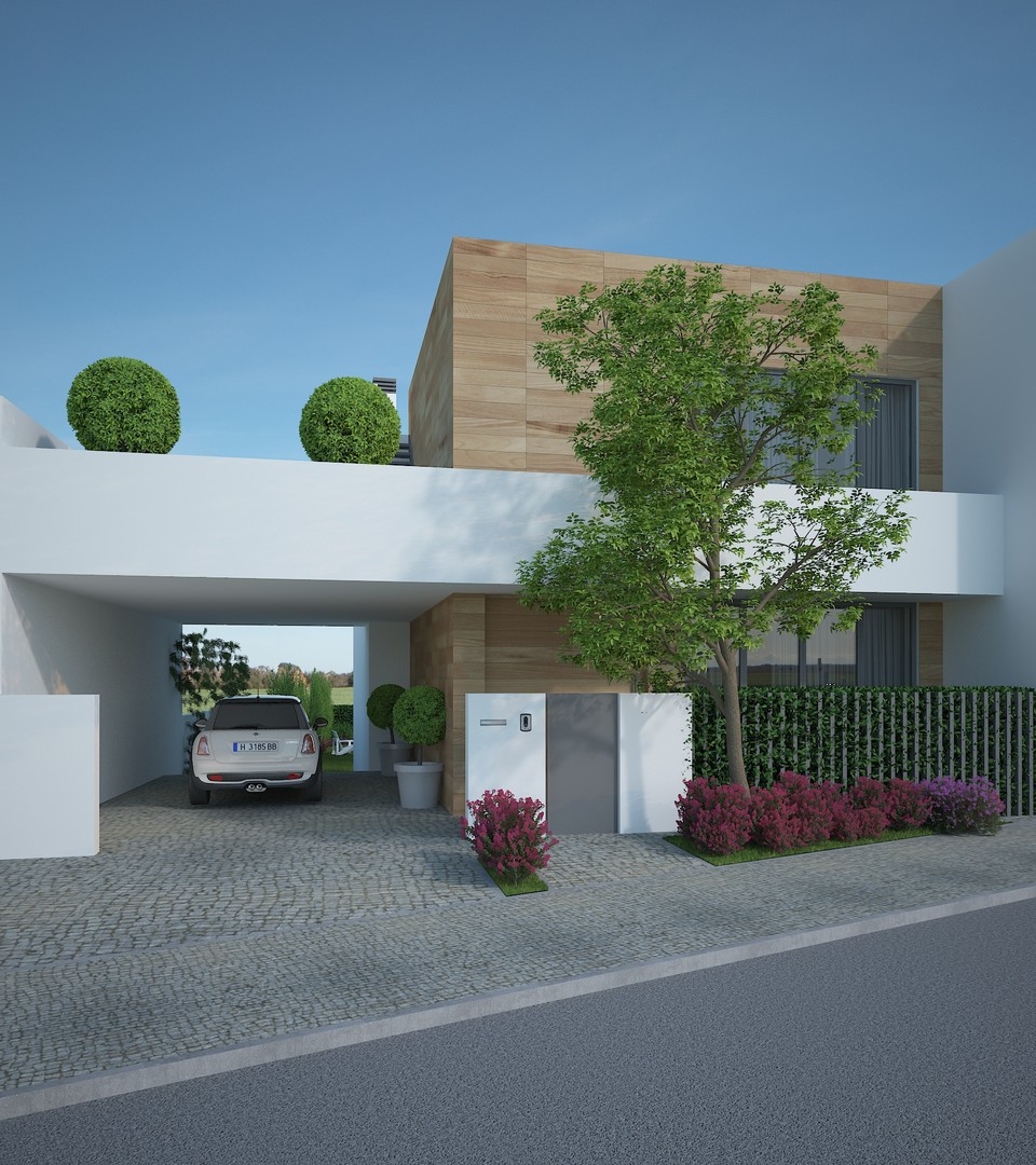 Alçado frontal de moradia moderna de dois pisos com garagem
